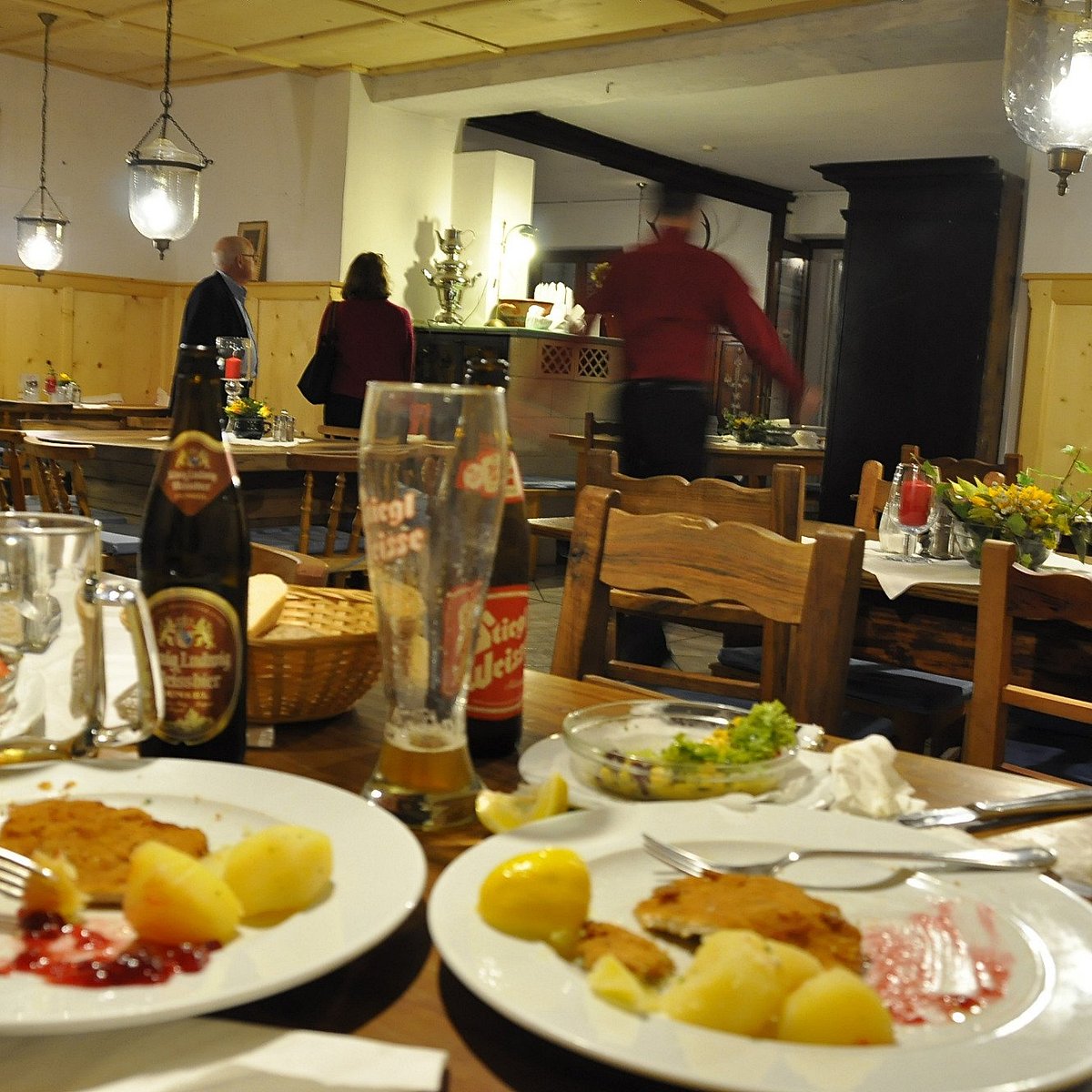 Traditional wood-furnished dining room at Restaurant am See