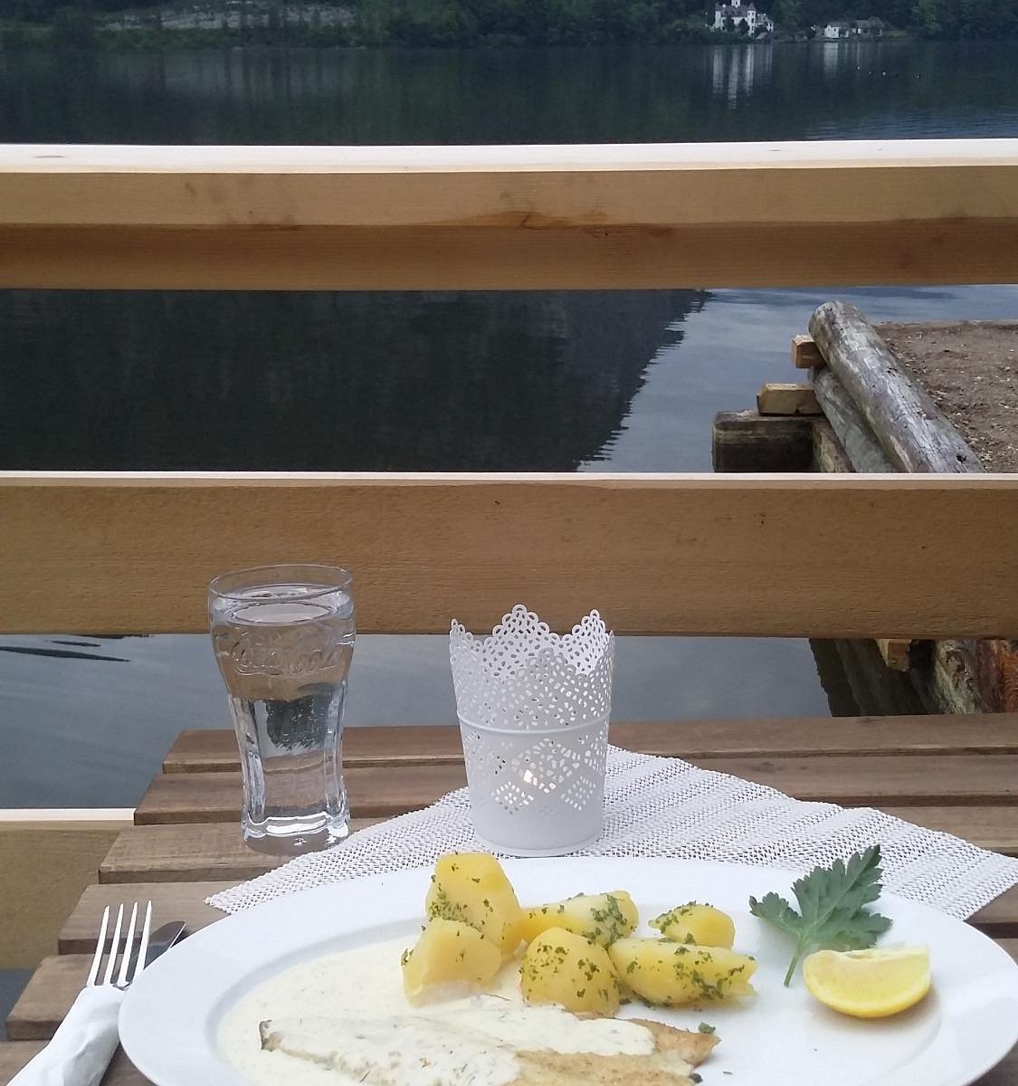 Fish with potatoes served overlooking Lake Hallstatt